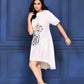 THE ARTISAN – IVORY ABSTRACT FACE DRESS
